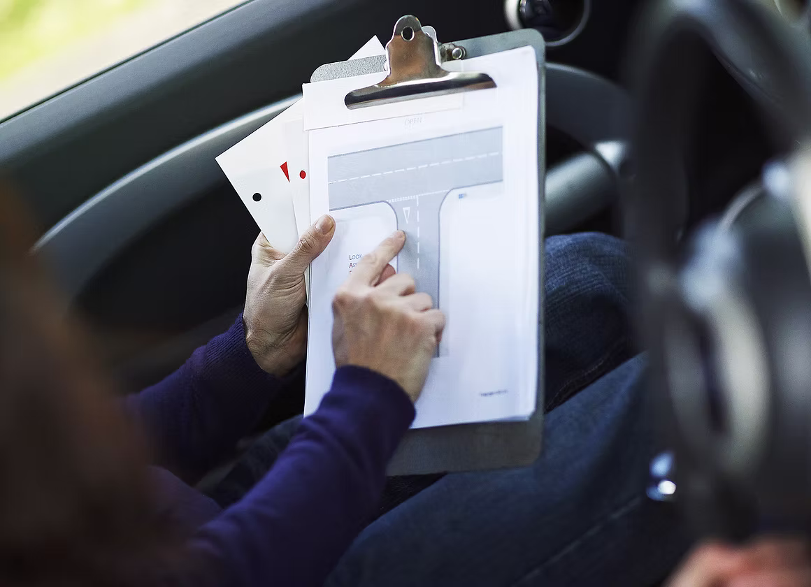 Instructor explaining driving rules